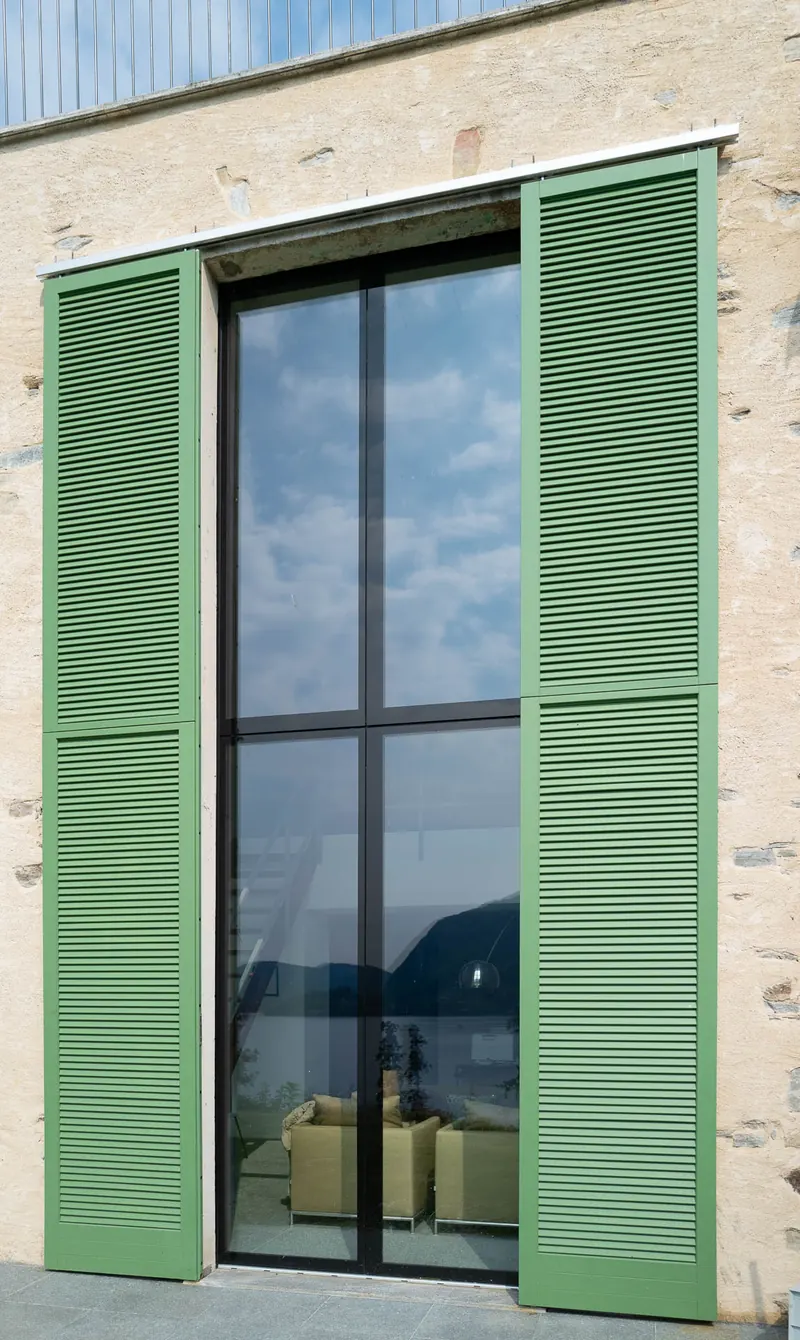 Casa Ludwig, tall French window with green shutters